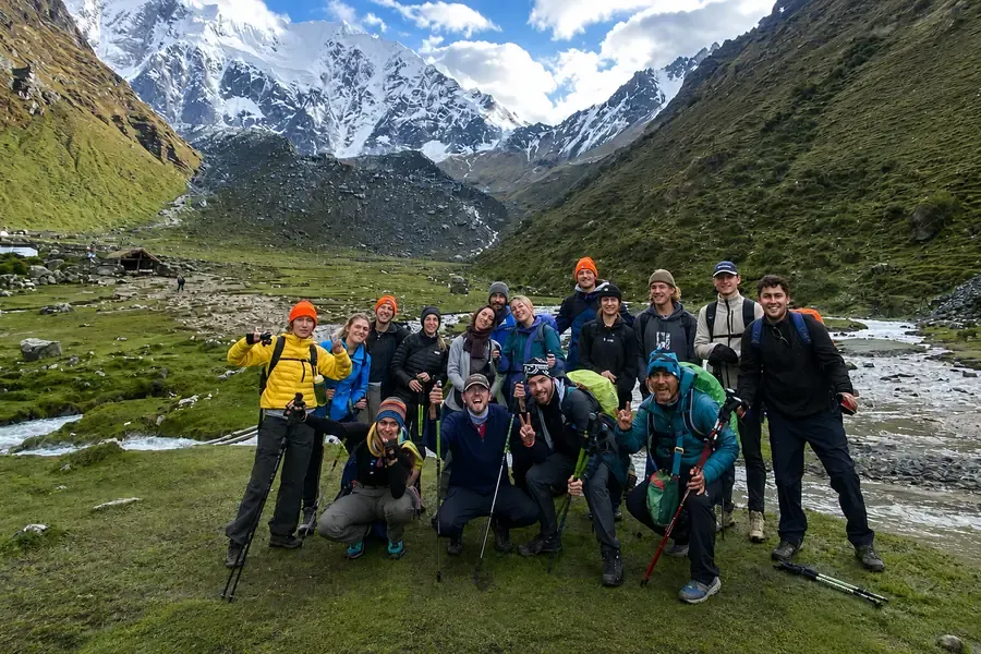 A trekking group resting together on the trail